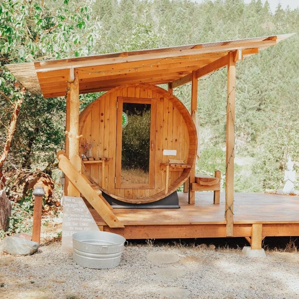Traditional outdoor barrel sauna design, built for larger groups.