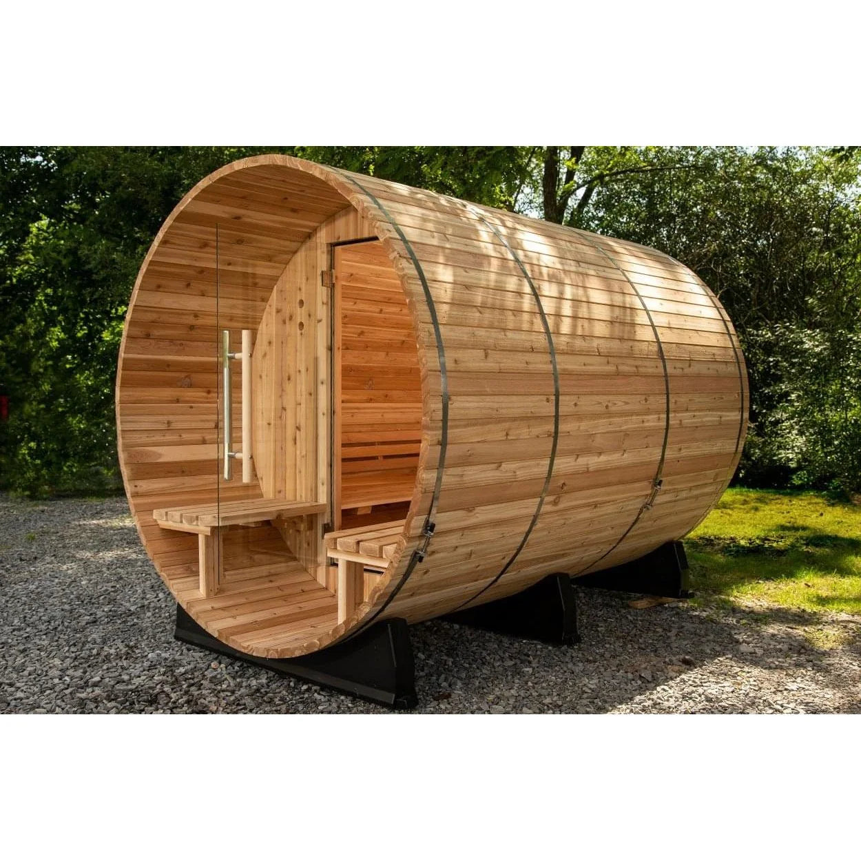 Outdoor barrel sauna with extended porch and rustic design.