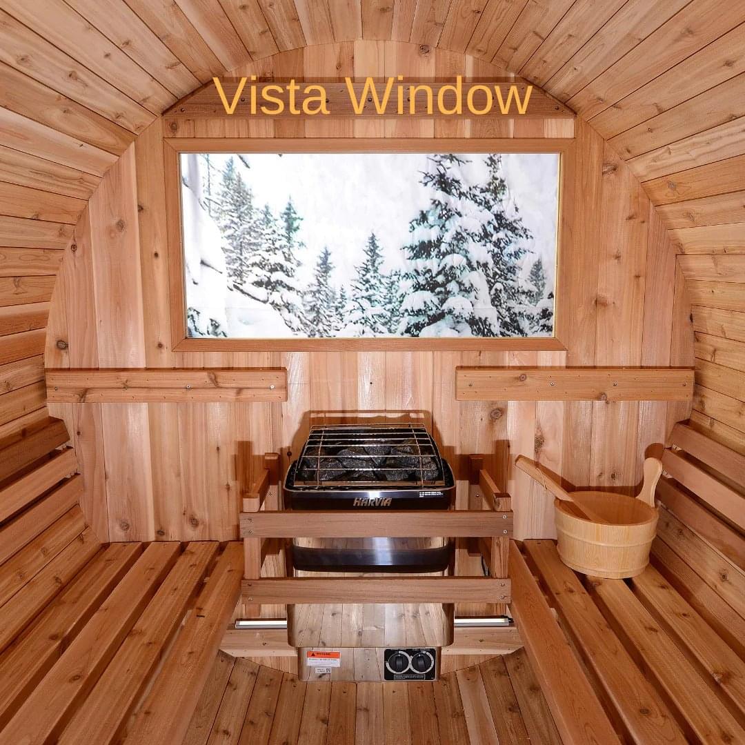Cozy barrel sauna interior with curved cedar benches for 4.