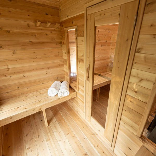 Traditional cabin sauna with extra waiting room.