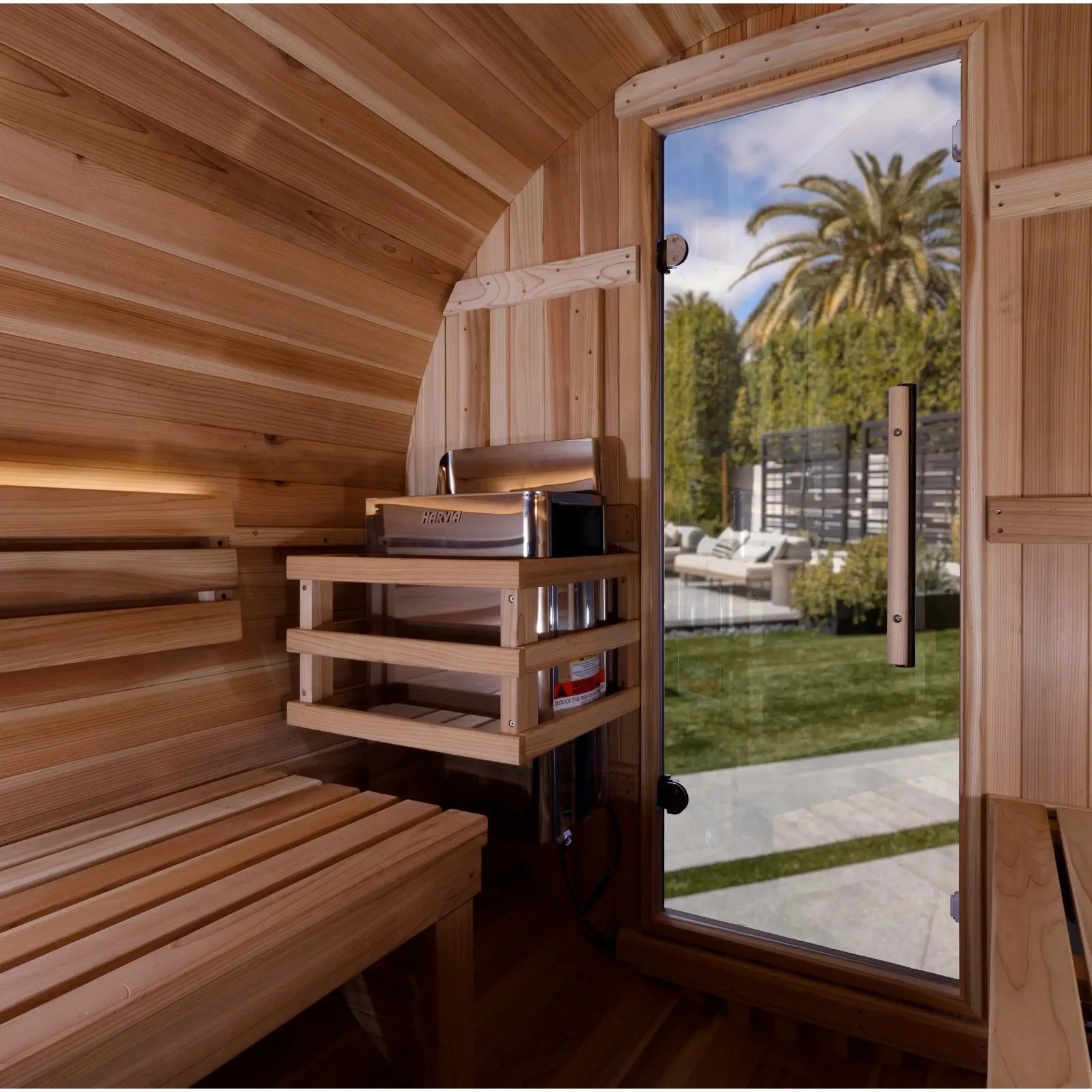 Rustic outdoor barrel sauna with efficient airflow and compact design.