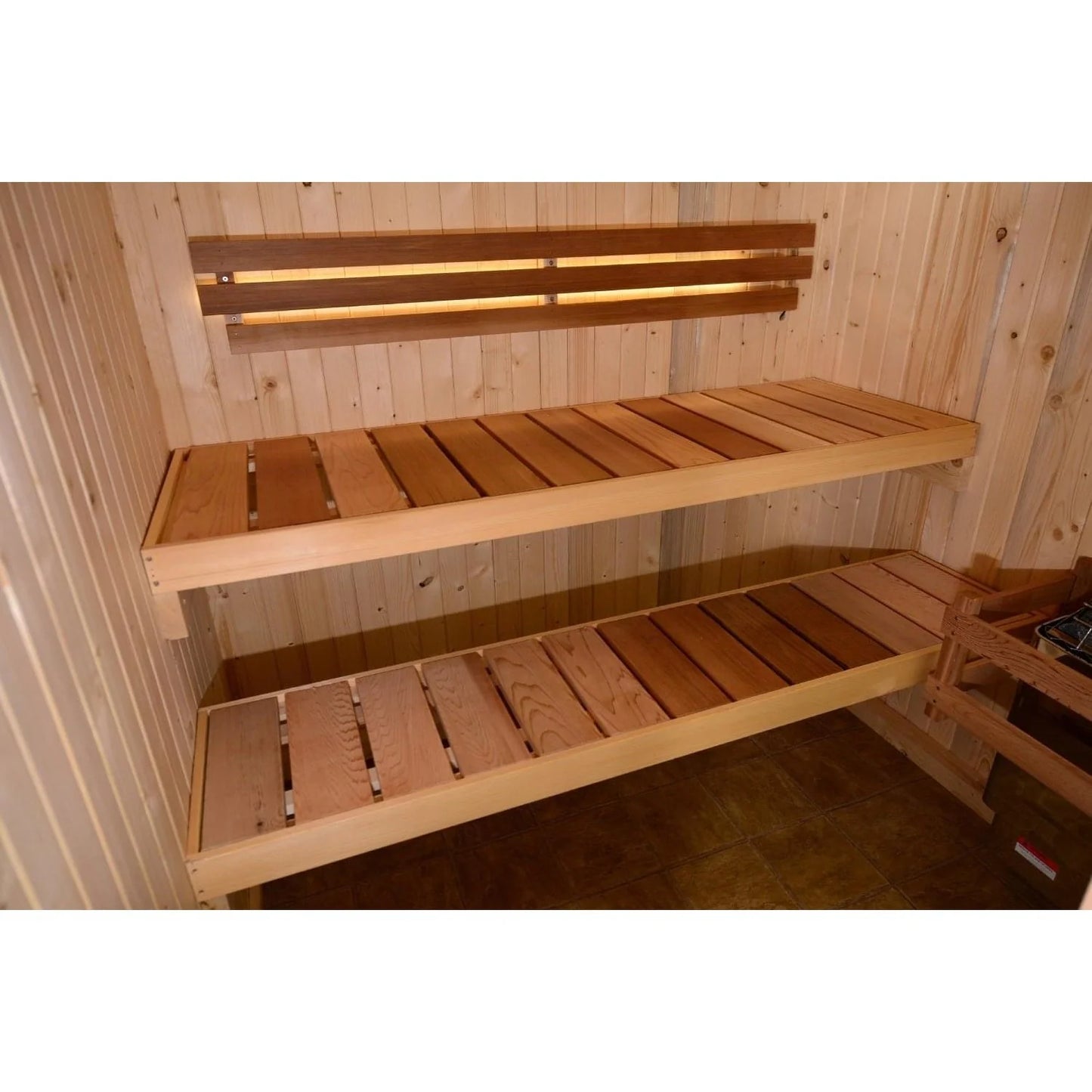 Traditional indoor sauna with cedar construction for home use.