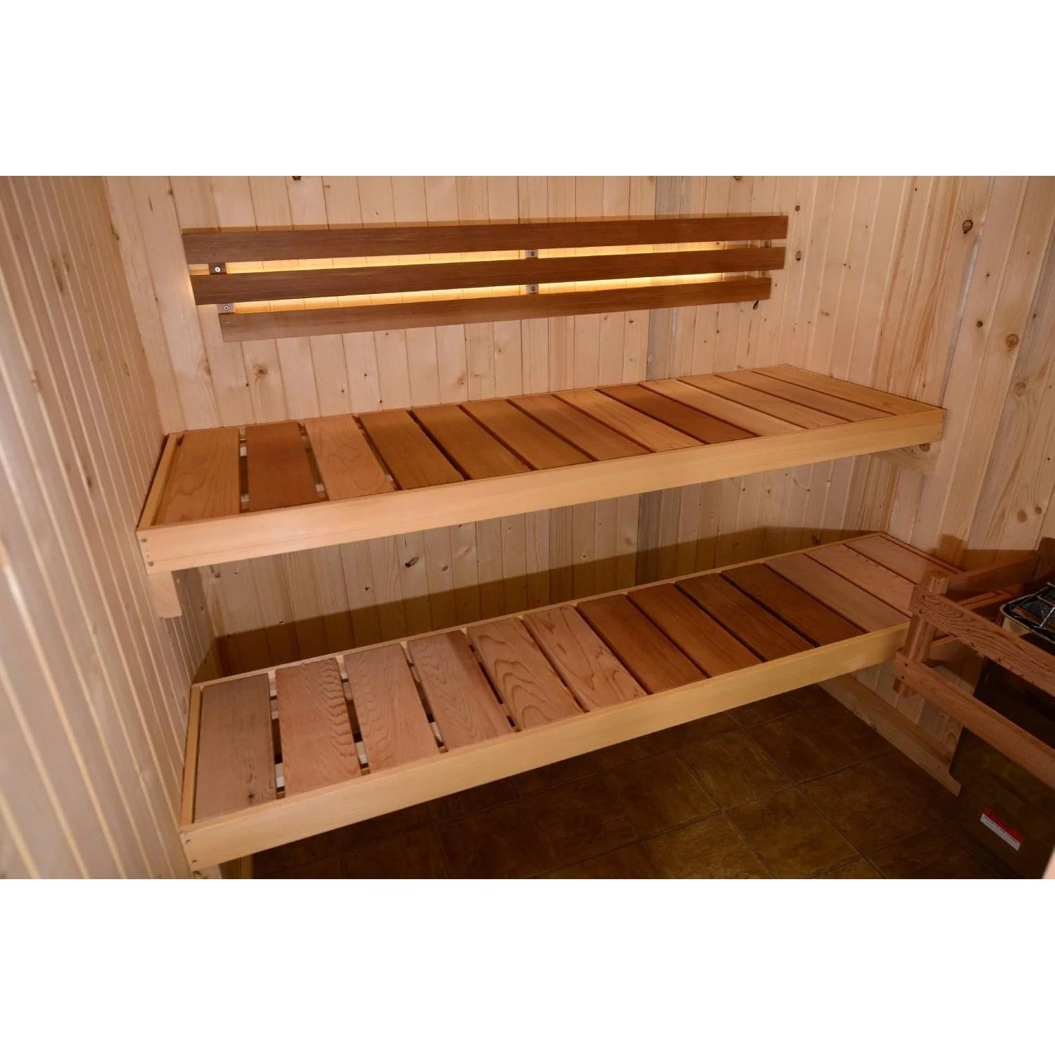 Traditional indoor sauna with cedar construction for home use.